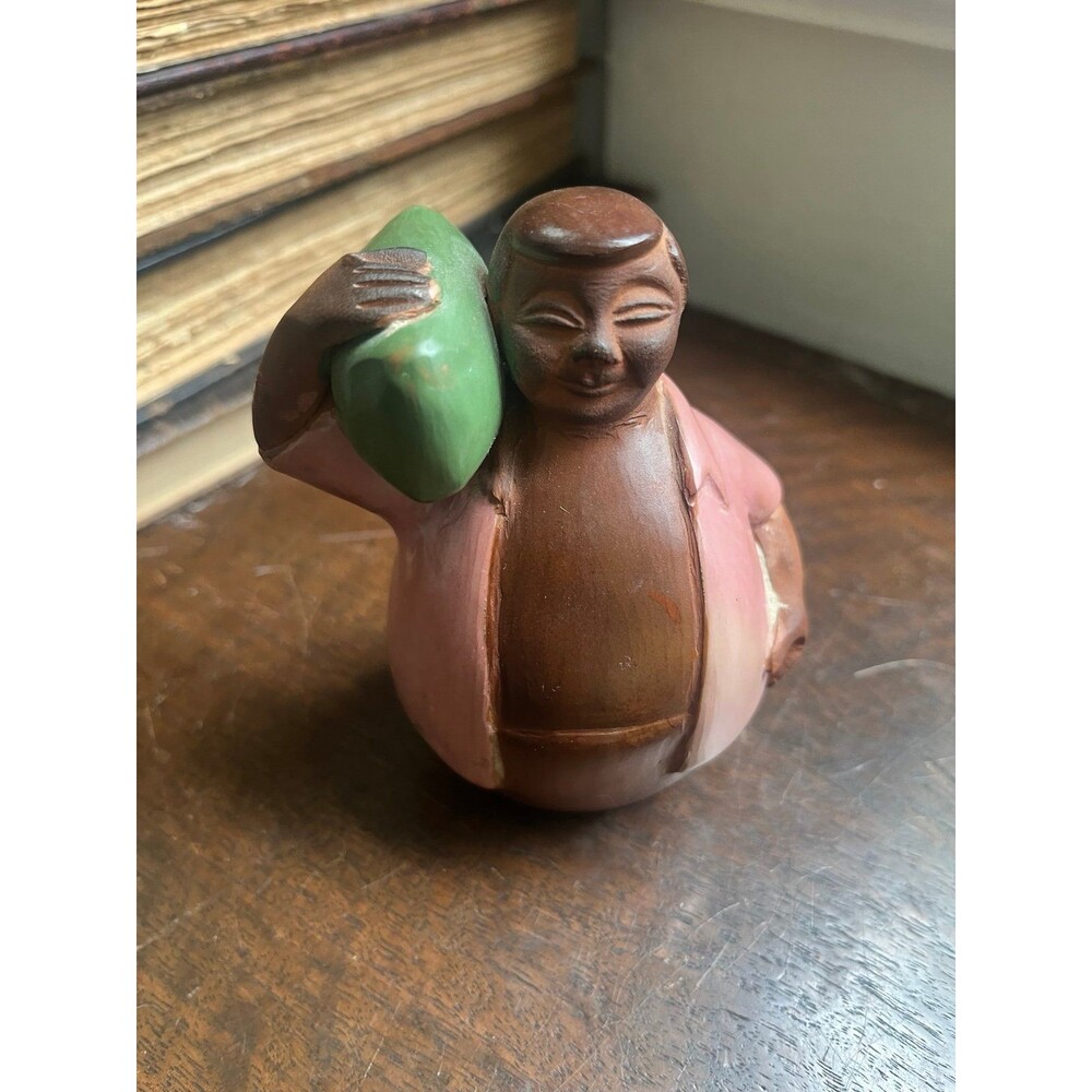 Vintage Peruvian Chulucanas Man Carrying Sack